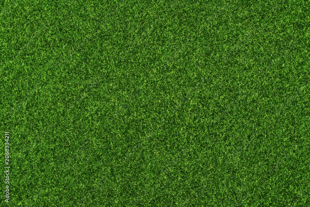 Fototapeta premium Green grass background, artificial turf texture top view