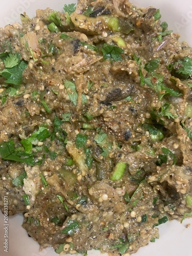 The picture shows a Thai dish called Larb Pla Duk (spicy catfish salad).