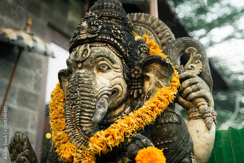Фотография Lord Ganesha sitting in meditating yoga pose at Villa entrance