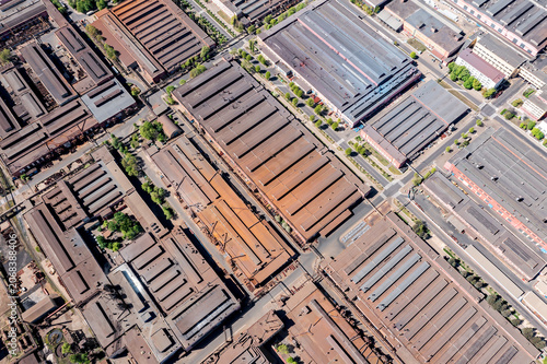 urban industrial district. roofs of industrial factory buildings and warehouses. aerial view.