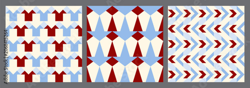Abstract op art chevron and arrow repetitive pattern in red, blue, and cream