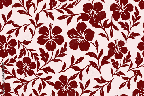 Seamless tropical hibiscus floral pattern with elegant leaves and bold crimson blooms on a soft blush background, perfect for fabric, decor, and wallpaper.