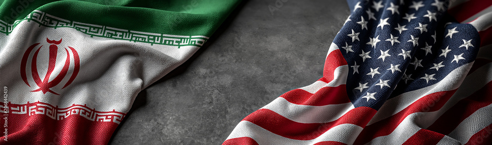 Obraz premium Bilateral Relations: A stark visual representation of diplomatic ties, juxtaposing the national flags of Iran and the United States, suggesting a complex relationship between the two nations.