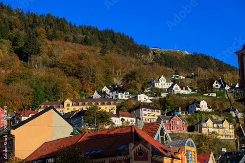 Mountain Fløyen with funicular railway Fløibanen seen from Bergen city centre in autumn, Norway