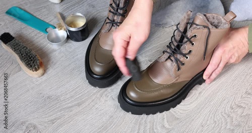 Branding commercial mockup for premium organic shoe care products line. High quality leather boots maintenance highlights professional retail presentation with copy space for corporate design. Modern
