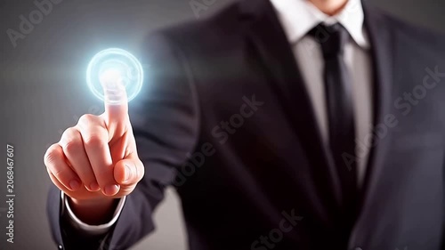 Businessman pressing glowing button
