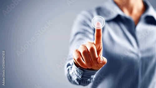 Person pressing glowing button