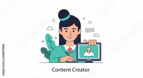 A woman with dark hair and a green sweater creating content on a computer