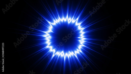Tableau sur toile Glowing blue circular energy ring with intense light streaks radiating outward on deep black background for futuristic digital effects and abstract scientific visual concept designs