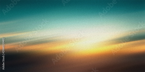 Фотография Beautiful cinematic sunrise landscape background with soft golden yellow and teal gradients blended with vintage film grain effect