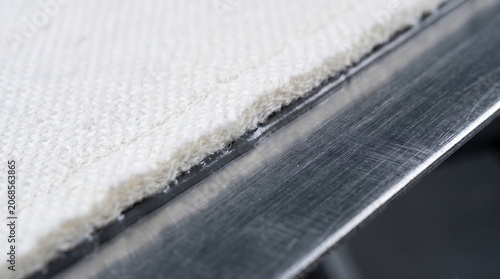 Ceramic fiber blanket bonding interface on metallic panel