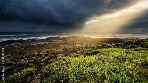 Divine light descends on coastal land during creation. Biblical genesis scene showing prehistoric earth with ocean and grass under stormy sky with golden ray.