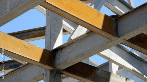 girder. Steel beams at a construction site, showcasing architectural progress and structural strength. real-estate listings.
