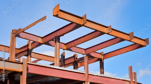 girder. Steel beams at a construction site, showcasing architectural progress and structural strength. real-estate listings.
