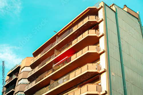 Low angle view of Spanish building architecture from below in urban setting