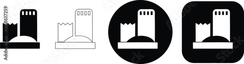 Fotografie Set of four building featuring a tall tower and smaller structure in solid black