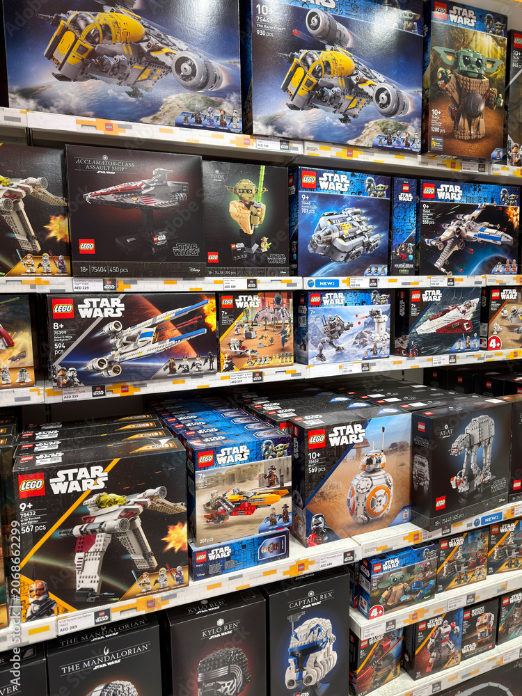 Naklejka premium Dubai, UAE - May 26, 2026: LEGO Star Wars construction sets displayed on retail shelves. Licensed collection remains popular among collectors, hobbyists and science fiction fans