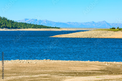 Beautiful Lake and mountains view with pine trees