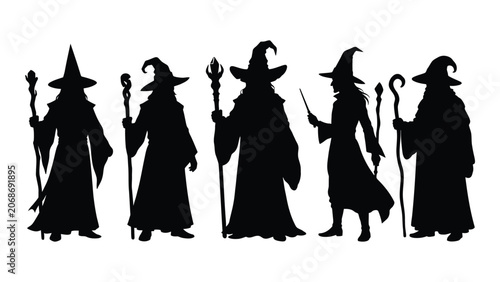 Fotografie Black silhouettes of five witches with magic wands