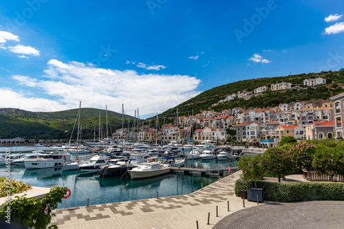 Upscale stone villas and elegant coastal architecture of the exclusive Lustica Bay luxury resort community. Montenegro