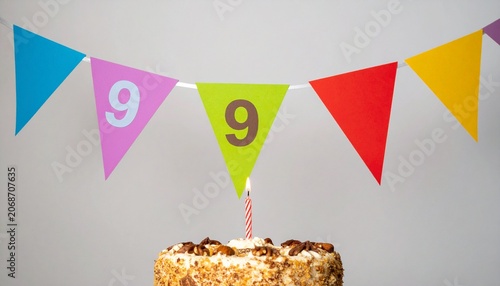 Festive Flag Garland and Cake with Number 99 for Birthday and Anniversary Party
