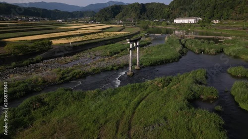 conic Torii Gate Overlooking Harajiri Falls, Aerial Drone View, Oita Japan