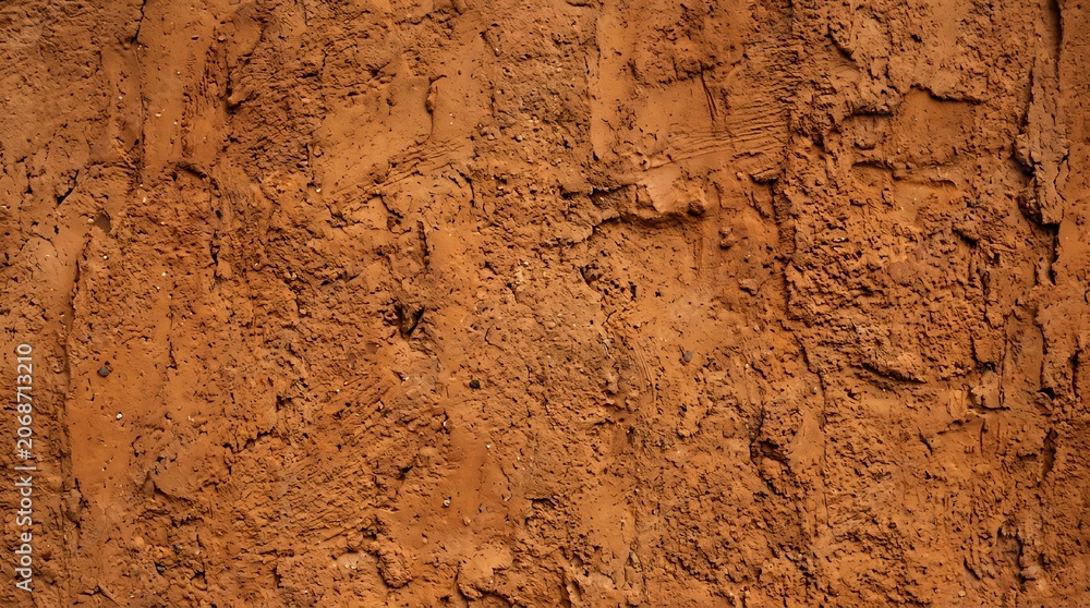 Fototapeta premium Closeup of rough brown clay surface.