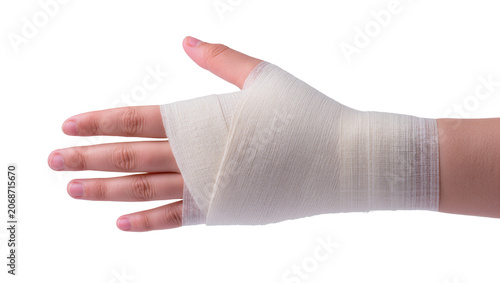 Fotografie Hand wrapped with white elastic bandage for support and protection