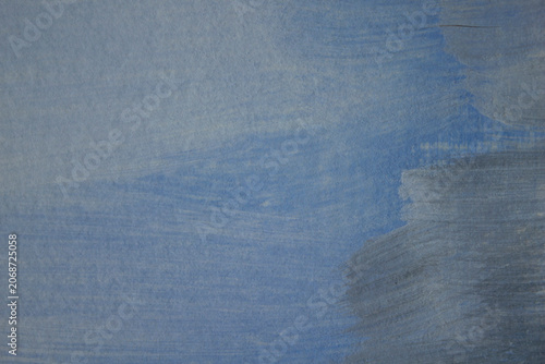 Modern abstract gray-blue painted texture featuring sweeping brush strokes. Elegant horizontal background with copy space, ideal for website headers, banners, presentations and graphic design projects