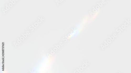 Transparent rainbow prism light with diamond crystal sparkle, glass reflections, optical bokeh glow and colorful lens flare abstract background design element