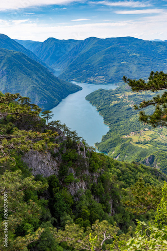 Spectacular look out from a high rocky cliff over the emerald green waters of the winding Drina River in Tara National Park