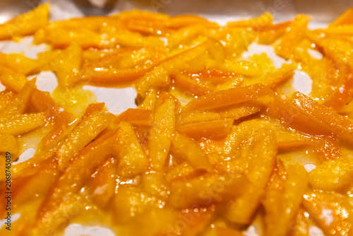 Top view of homemade candied orange peels drying