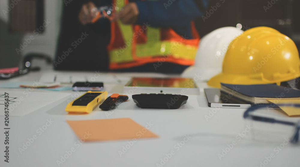 Fototapeta premium Alternative energy environment businesspeople checking solar cell panel and discuss about document