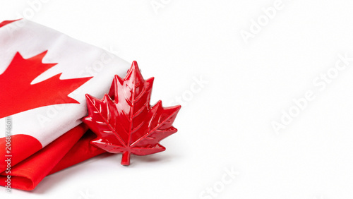 Glossy red maple leaf ornament with Canadian flag fabric