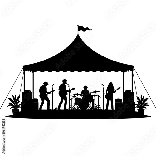 Silhouette of musicians performing on stage under a festival tent  