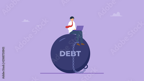 Businessman chained to a big weight debt working on laptop. Work hard to pay off debts or get out of debt concept.