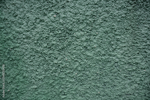 Photos Dark green rough stucco wall texture