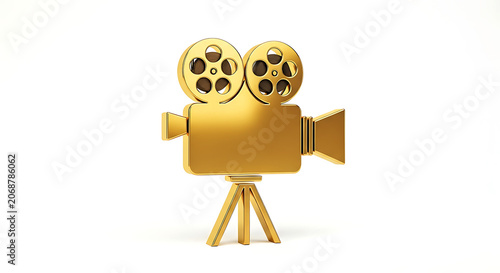 Golden vintage film camera on tripod with reels and lens movie cinema