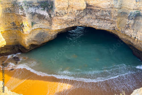 Landscape of the rocky beach in Algarve area Portugal