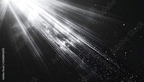Black and white abstract background with bright light rays, particle dust, glowing particles, digital lens flare, energy effect