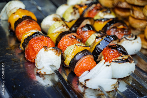 Konstfotografi Grilled vegetable skewers with charred tomatoes, peppers, onions and eggplant