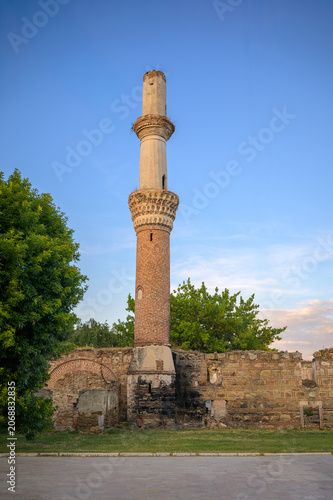 Ottoman Minaret with Muqarnas Detail Rising above Ruined Mosque Walls at Golden Hour -Prilep, North Macedonia