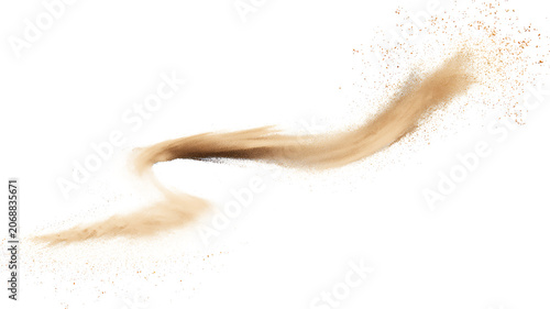 Obraz na plátne Golden sand splash with dynamic airborne particles isolated on white