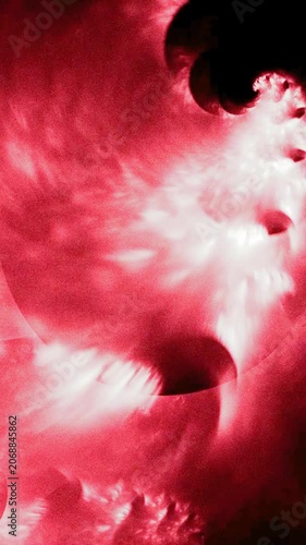 Dramatic Dark Red and Bright White Abstract Swirling Fractal. Dynamic Energy Waves and Cosmic Cloud Vortex Vertical Motion Graphic