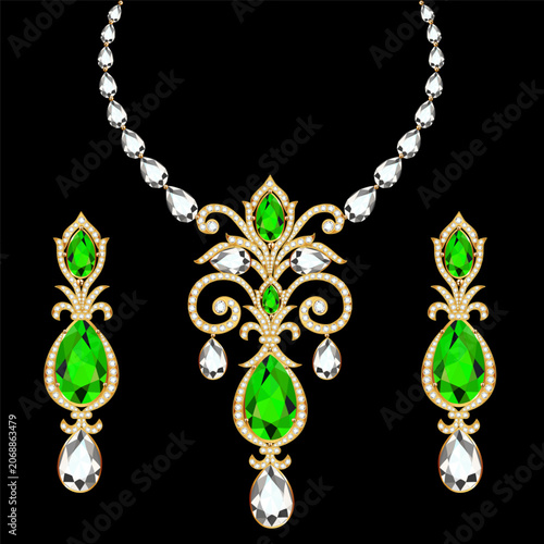 Foto jewelry pieces consisting of a necklace and earrings featuring emeralds and diamonds set in gold with silver accents