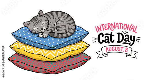 Tabby cat sleeping on pillows for International Cat Day greeting.