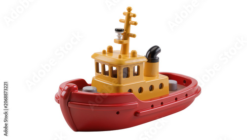 Quadro su tela Red and yellow toy tugboat with mast and smokestack