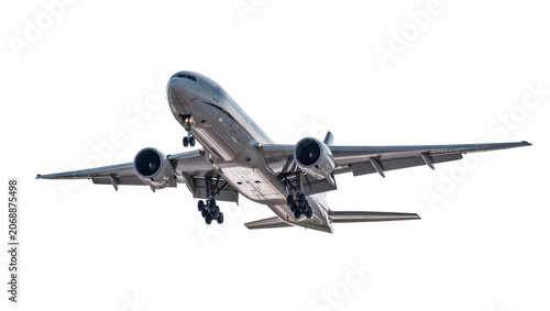 Foto Commercial airplane with landing gear extended, ascending
