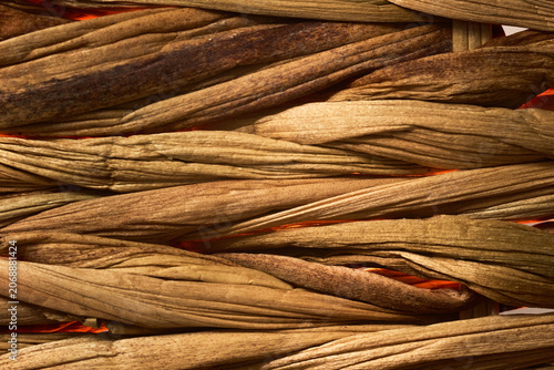 Woven straw texture with warm glowing backlight effect