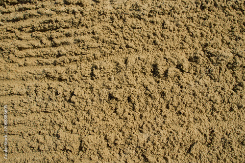 Fotografie Daytime outdoor shot of industrial bulk building aggregate sand with high granul